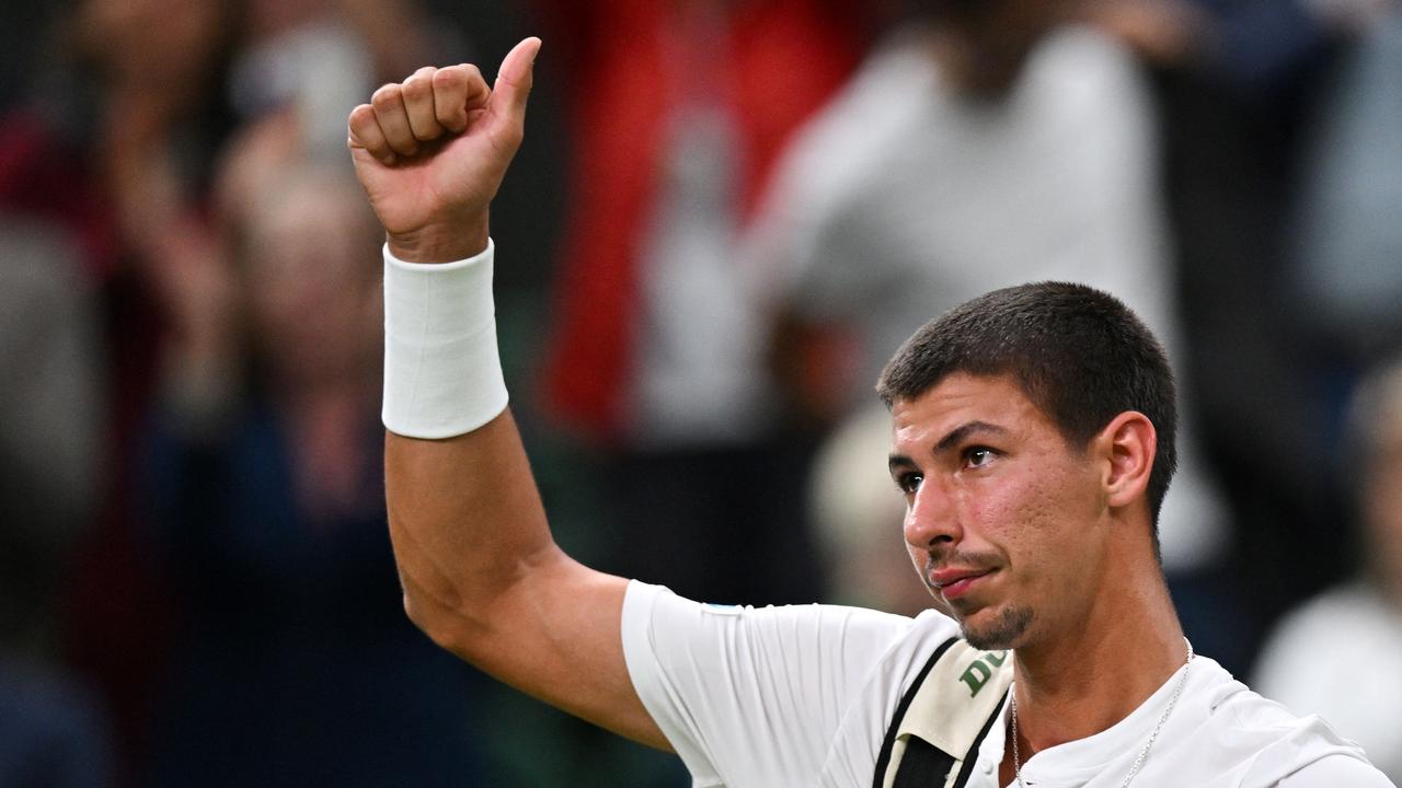 Australia's Alexei Popyrin waves to the crowd as he leaves Centre Court after loosing against Serbia's Novak Djokovic.