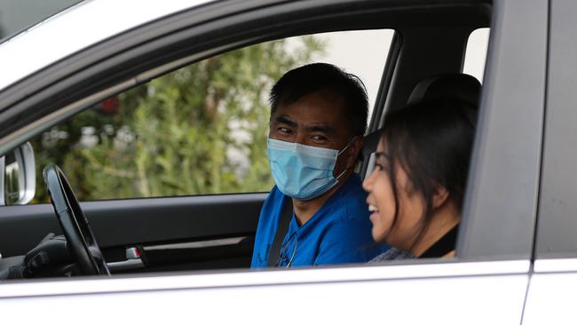 Gissella Martinez and her father Willy Martinez queue up to get tested. Photo: NCA NewsWire/Gaye Gerard