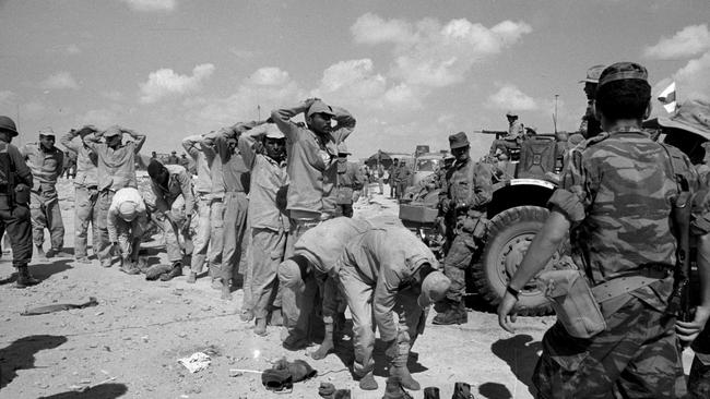 Egyptian prisoners are rounded up by Israeli troops after being captured near Al Arish in the Sinai during the Six Day War in 1967. Picture: Supplied