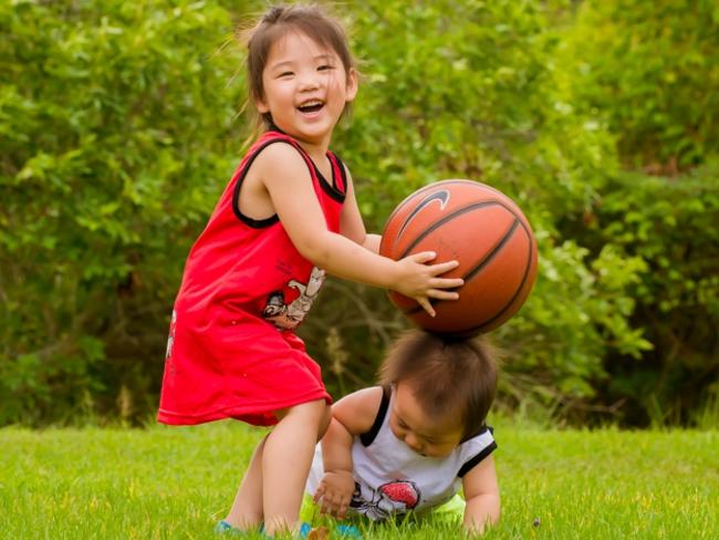 Doris Sun, pictured with her younger brother Oliver, before she was diagnosed with a fatal strain of brain cancer.