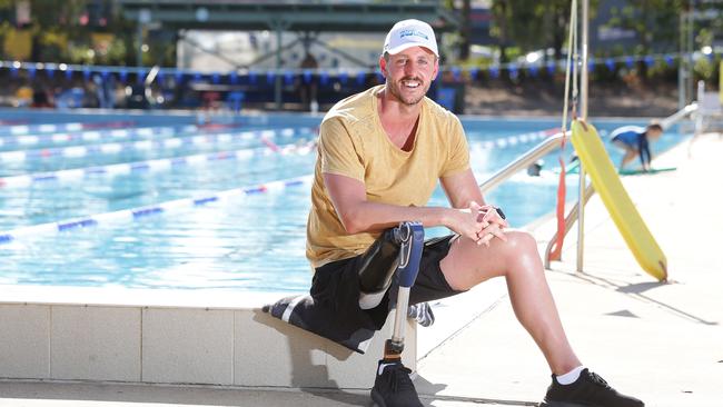 Paralympic swimmer Brenden Hall poses at Lawnton Aquatic Centre at Lawnton. Photo: AAP /Claudia Baxter