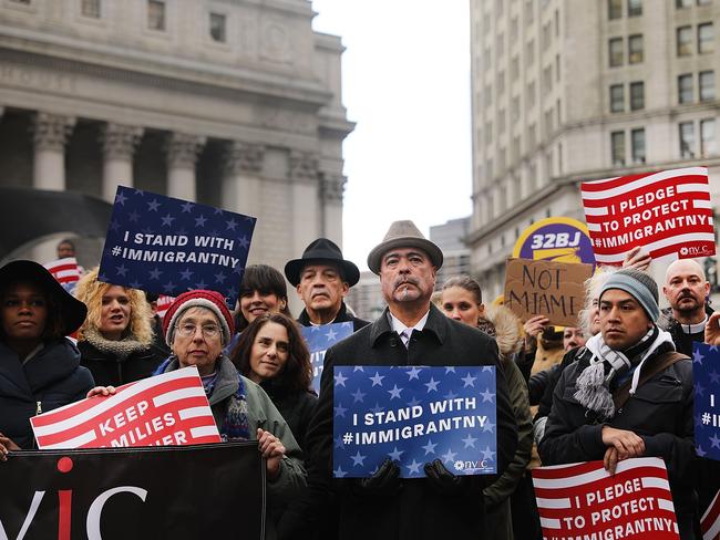 Muslims and local immigration activists participate in a prayer and rally against Mr Trump's immigration policies in New York City. Picture: Spencer Platt/Getty Images/AFP