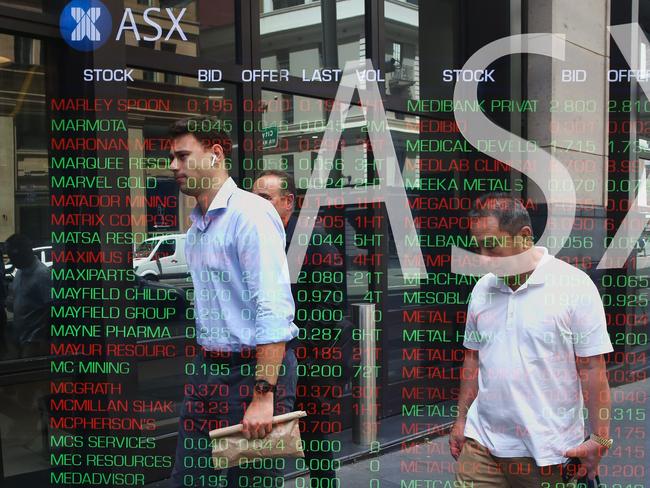 SYDNEY, AUSTRALIA - Newswire Photos -November 14, 2022 A general view of members of the public walking past the digital boards at the ASX in Sydney. Picture: NCA Newswire / Gaye Gerard