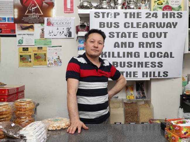 Business owner Mohammad Rezaee, poses for a photo at his grocery store in Baulkham Hills. Picture: David Swift