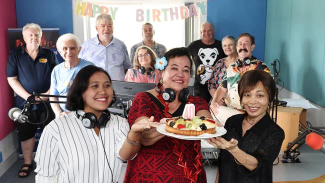 Cairns FM 89.1 community radio station will celebrate 40 years of broadcasting this Saturday The station is on air 24 hours a day thanks to more than 100 volunteers from many different nationalities and ethnic groups. (Front row) Nita Simatupang, Perise Foai Hunt and vice president Prapasiri Techo are joined in celebration by their colleagues Peter Ricketts, Mike Friganiotis, president Brian Stevenson, Itin Hadijah, Glenn Best, Dave Chambers, Anna Chito and Alan Searle at the radio station's studios at Cairns Tafe, Manunda. Picture: Brendan Radke