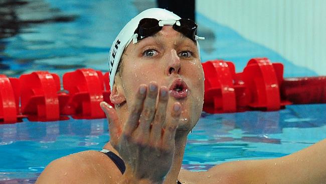 Klete Keller of the United States blows a kiss to the crowd after swimming in the 4x200-meter freestyle relay during preliminaries on Tuesday, August 12, 2008, in the Games of the XXIX Olympiad in Beijing, China. (Photo by Jeff Siner/Charlotte Observer/Tribune News Service via Getty Images)