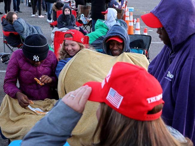 Supporters of Donald Trump wait for him to arrive during a pit stop in the battleground state of Arizona. Picture: Getty Images/AFP