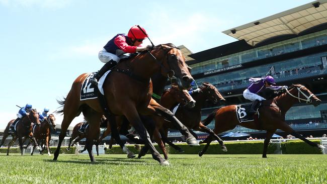 John Thompson filly Open Secret (red cap) denied the fast-finishing United States (purple) to win the two-year-old race at Randwick. Picture: Jeremy Ng/Getty Images