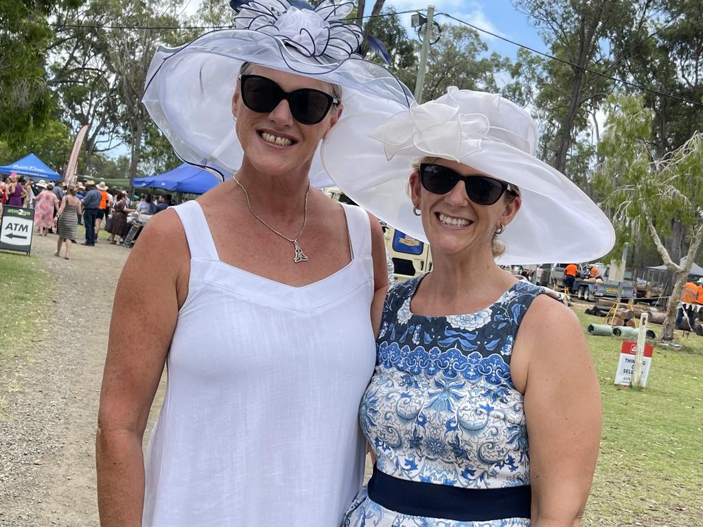 Carol McNaughton and Lisa Webster having a ball at the Torbanlea Picnic Races.