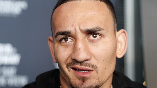 UFC featherweight champion Max Holloway responds to reporters' questions.