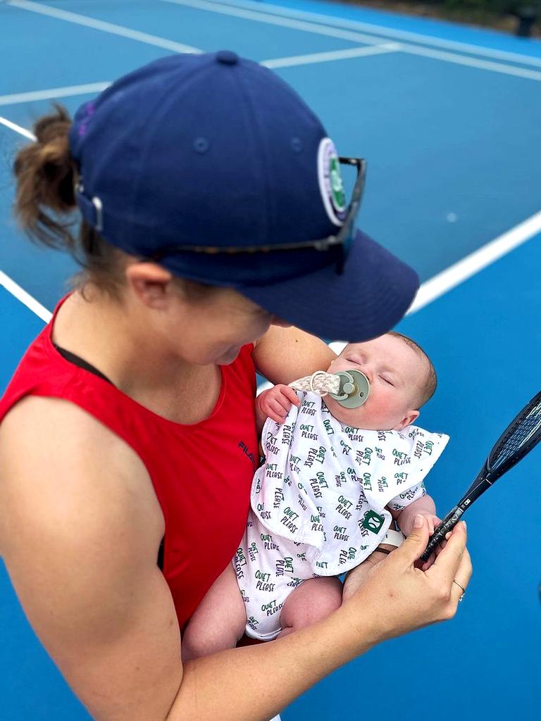 Barty introduced two-month-old son Hayden to the court in her post.