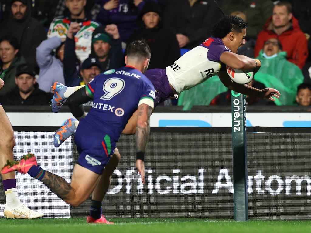 Storm fullback Sua Fa'alogo performs a swan dive as he scores a try, only to hurt himself on the landing. Picture: Getty Images