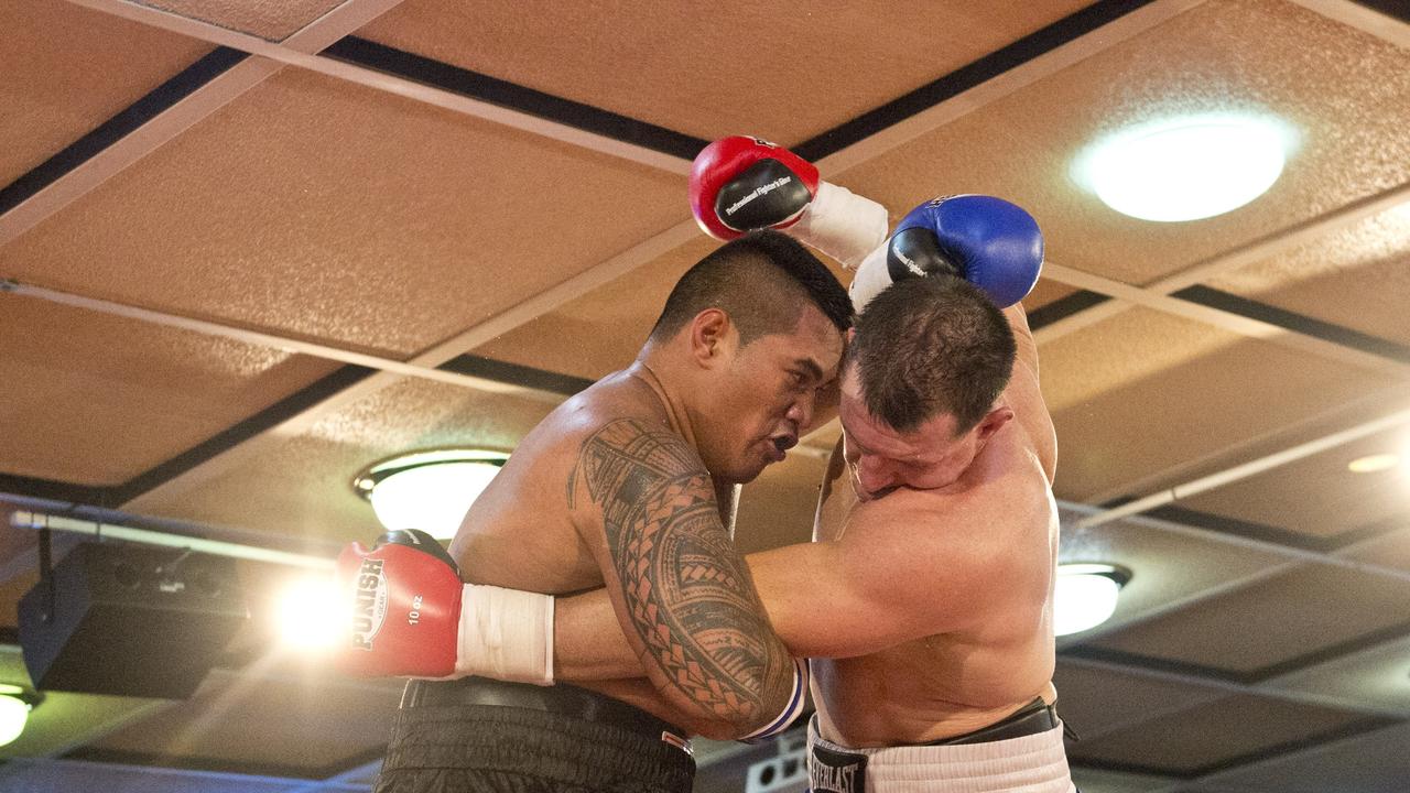 Paul Gallen and Herman Ene-Purcell fight it out in Toowoomba. Friday, Jan 29, 2016.