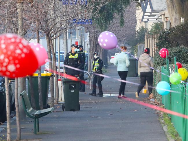 Balloons were tied to the fence outside the North Melbourne towers as restrictions were eased. Picture: David Crosling/ NCA NewsWire