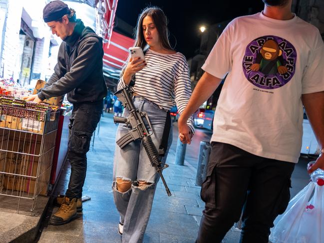 An armed woman walks through Jerusalem during increased tensions between Palestinians and Israelis. Picture: Getty Images