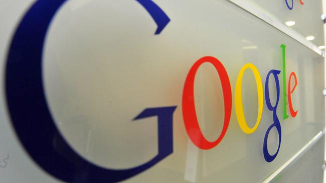 (FILES) - A photo taken on February 5, 2014 shows the Google logo on a wall at the entrance of the Google offices in Brussels. Germany's justice minister called for the possibility of dismantling Google if it abuses its dominant market position, in an interview with a newspaper to be published on June 28, 2014. AFP PHOTO GEORGES GOBET