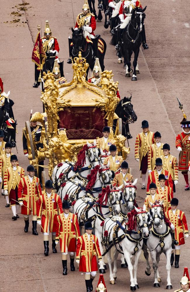 The original golden coronation carriage with a hologram of the Queen is seen during the Platinum Pageant. Picture: Getty Images