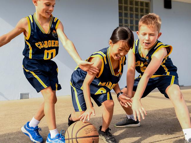 Angus, Chloe and Eddy, all 9, love their basketball but their club needs a new home so the can accept more young players. Picture: Penny Stephens