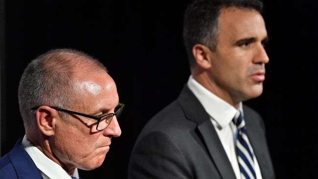 Premier Jay Weatherill and Health Minister Peter Malinauskas address the media over the ICAC findings. AAP Image/David Mariuz