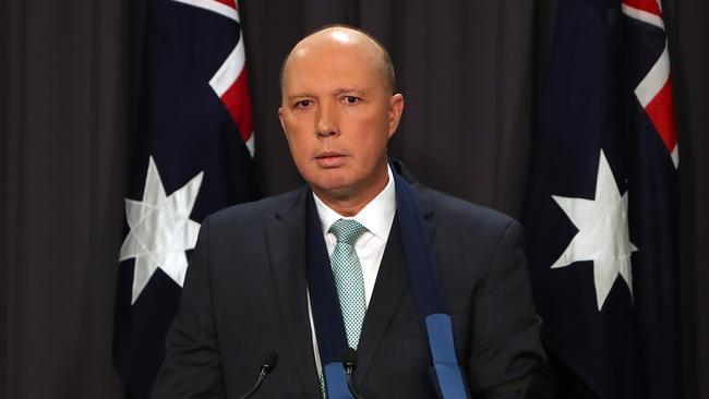 Home Affairs Minister Peter Dutton holding a press conference at Parliament House in Canberra.