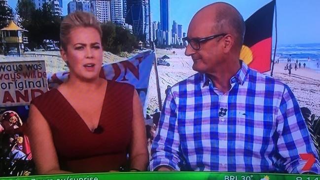 Protesters behind Channel Seven’s Sunrise broadcast on the Gold Coast.