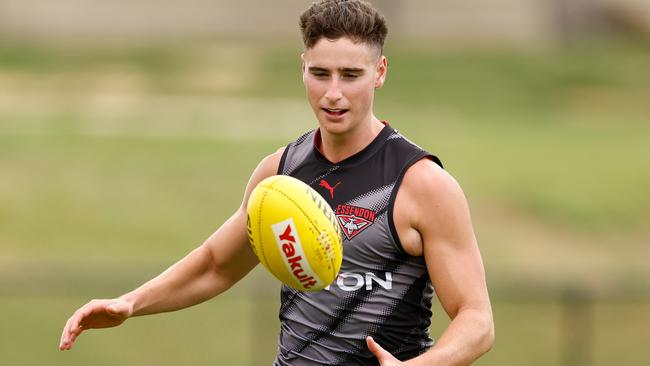 MELBOURNE, AUSTRALIA - JANUARY 16: Elijah Tsatas of the Bombers in action during the Essendon Bombers AFL training session at The Hangar on January 16, 2025 in Melbourne, Australia. (Photo by Michael Willson/AFL Photos via Getty Images)