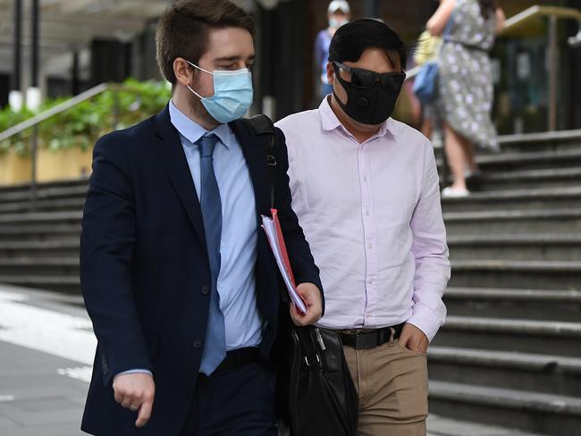 Lam, pictured right with his lawyer, was in on the fix through a punter who used Wickr to communicate with the employees. Picture: NCA NewsWire/Joel Carrett