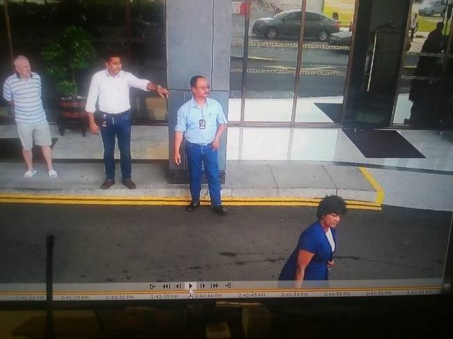 The last known photo, taken from CCTV, of Annapuranee Jenkins as leaving her hotel in Penang, Malaysia in 2017. Her husband Frank Jenkins (far left) watches.