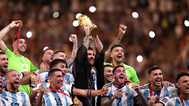 Lionel Messi in a robe during Argentina’s celebrations.