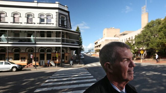 Mike Angus in front of the Grand Hotel, Newcastle.