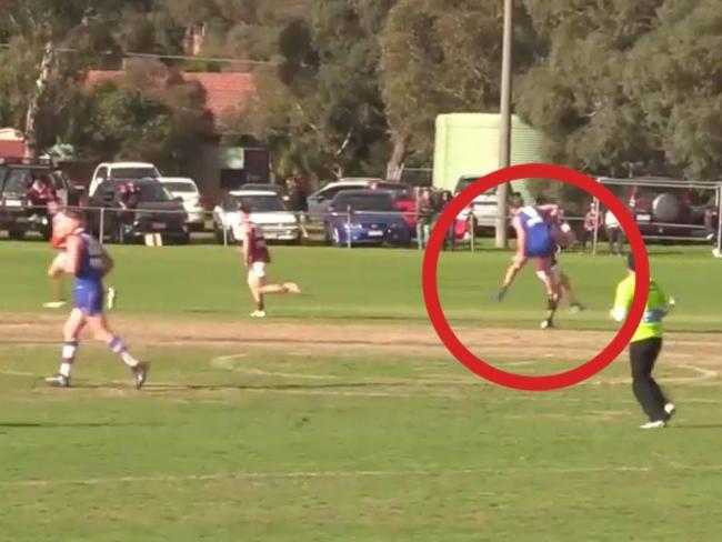 Lower Plenty's Tim Duckworth is hit during the Northern Football League match.