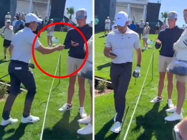 Rory McIlroy confronts a fan and walks away with his phone. Photos: X