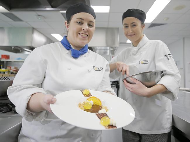 Maddison Jordan, of Prospect, and Chloe Morice, of Longford, competed in the Chef's Hat competition at TasTAFE's Drysdale campus in Hobart. Picture: PATRICK GEE