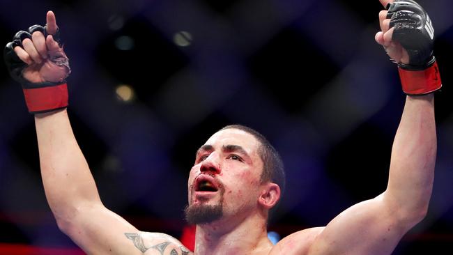 CHICAGO, IL - JUNE 09: Robert Whittaker of New Zealand celebrates after his middleweight title fight against Yoel Romero of Cuba during the UFC 225: Whittaker v Romero 2 event at the United Center on June 9, 2018 in Chicago, Illinois. Whittaker won by a split decision. (Photo by Dylan Buell/Getty Images)