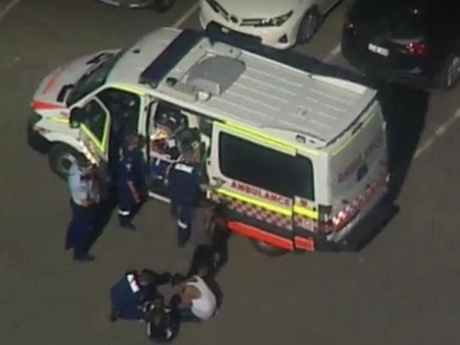 MUST CREDIT 7NEWS - Paramedics are fighting to save the life of a 24-year-old swimmer who has been pulled from the sea at Stanwell Park south of Sydney this afternoon.The man was seen floating in the water. Five ambulance crews and a helicopter are on standby at the beach where members of the local surf life saving club began CPR before the paramedics arrived.