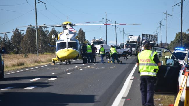 The LifeFlight helicopter landed on the Warrego Highway after responding to the crash. Picture: Sam Turner