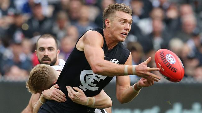 AFL Round 8. Carlton v Collingwood at the MCG. 10/05/2019.  Patrick Cripps of the Blues clears by hand 3rd quarter    .  Pic: Michael Klein.