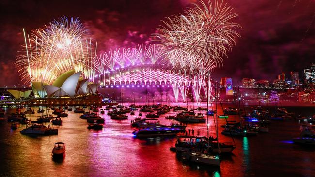 Sydney Harbour Bridge illuminated by fireworks. Drinking less on New Year’s Eve is one way to avoid a hangover. Picture: Getty Images