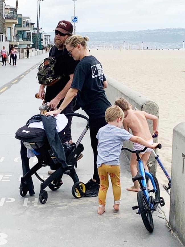 Lara Bingle and husband Sam Worthington on Manhattan Beach with their boys. Picture: Supplied