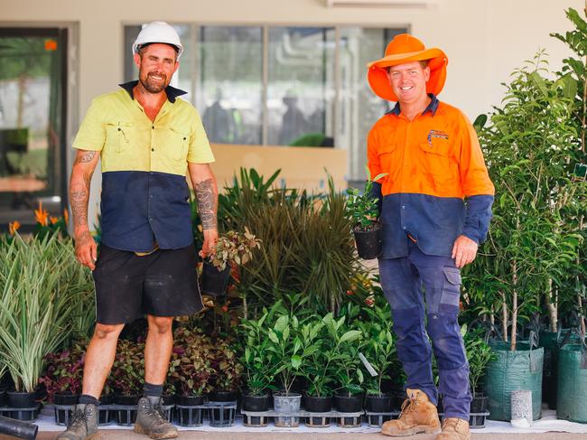 Project Landscaping owner Troy David (R) employed some tradies like Sean Nelson (L) under the NTG's home improvements stimulus package