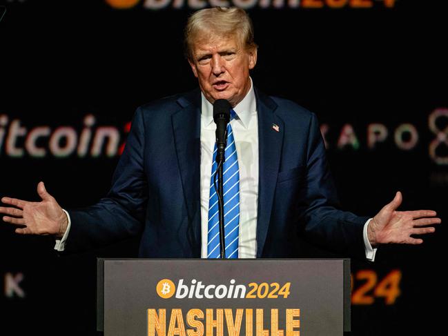 (FILES) Former President and 2024 Republican presidential candidate Donald Trump gestures while giving a keynote speech on the third day of the Bitcoin 2024 conference at Music City Center July 27, 2024 in Nashville, Tennessee. Images/AFP. Trump's triumphant return to the White House signals a potential golden era for cryptocurrencies, whose influential backers heavily supported his presidential bid. After years of ascendancy following bitcoin's emergence, the cryptocurrency industry had fallen into a "crypto winter," plagued by scandals and hostile regulatory oversight. But Trump's impending presidency has spurred an enthusiastic market response, with bitcoin surging more than 25 percent in a week and breaking through the $90,000 mark for the first time. (Photo by Jon CHERRY / GETTY IMAGES NORTH AMERICA / AFP)