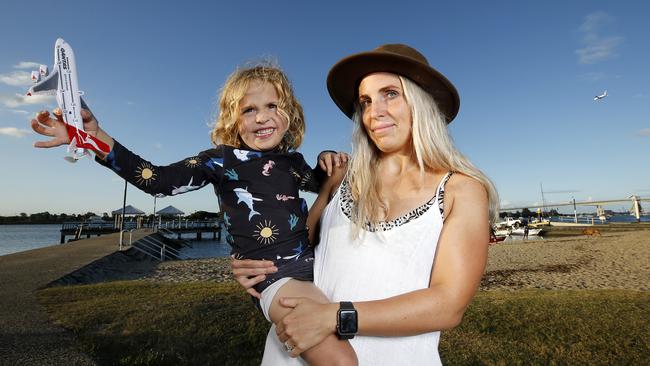 Zoe and Sunny Earl aren’t happy with the noise from the second runway at the Brisbane Airport. (Image/Josh Woning)