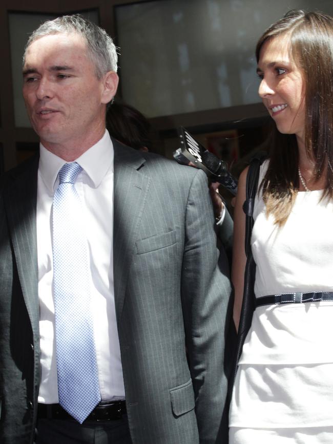 Thomson leaves the Melbourne Magistrate court with then-wife Zoe Arnold back in 2013. Picture: AAP