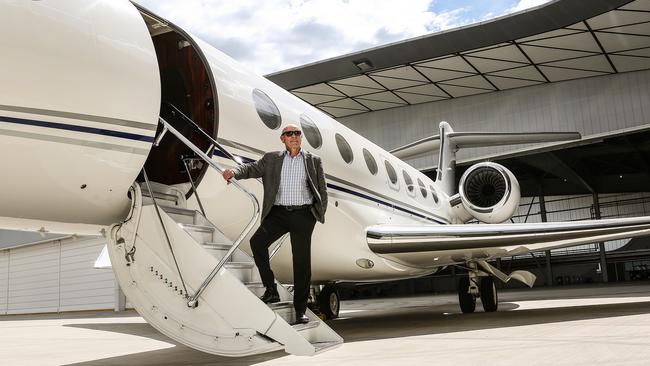 Paul Little with his private jet at the Jet Base in Tullamarine, Melbourne. Picture: Julian Kingma