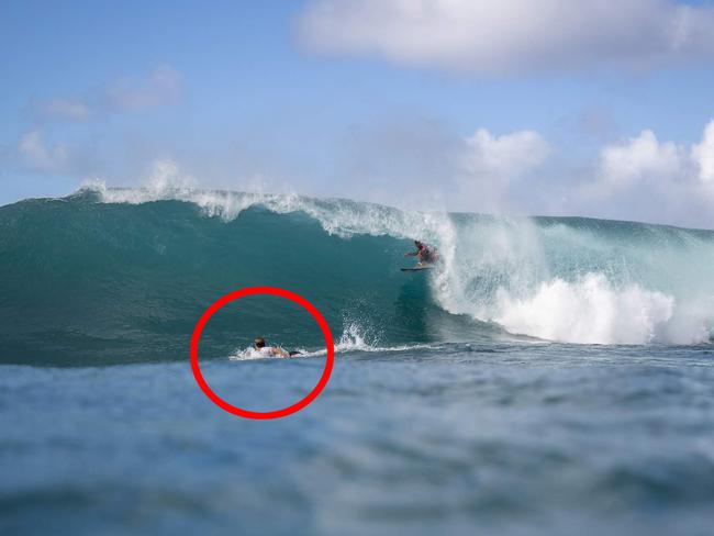 Jack Robinson attempts to paddle out of the way.