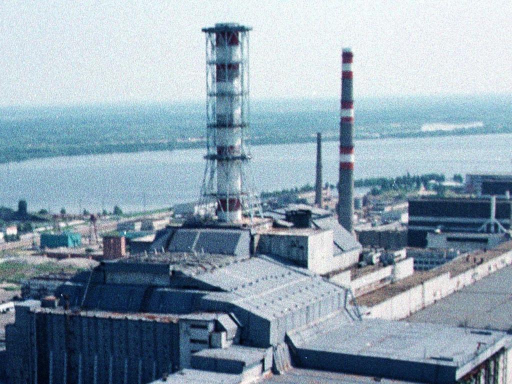 A chimney towers over destroyed Reactor No.4. Picture: Supplied