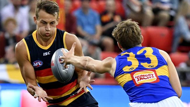 Untried first-round draft pick Tom Doedee will push his claims for a spot in Adelaide’s back six in the JLT Community Series. Picture: Sam Wundke ((AAP).