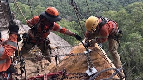 Specialist crews secured the boulder yesterday.