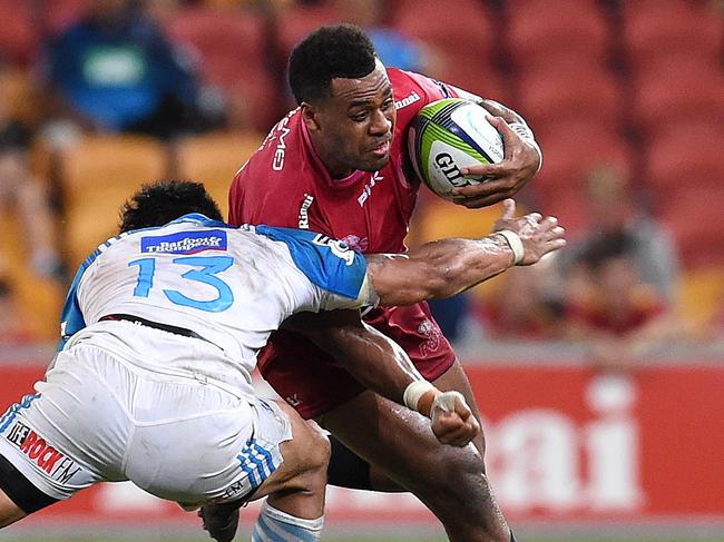 Samu Kerevi of the Queensland Reds (right) is tackled by Male Sa'u of the Auckland Blues during their round 4 Super Rugby match at Suncorp Stadium in Brisbane, Saturday, March 19, 2016. (AAP Image/Dan Peled) NO ARCHIVING, EDITORIAL USE ONLY