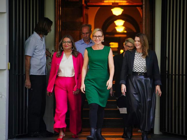 MELBOURNE AUSTRALIA - NewsWire Photos MAY 15, 2025: Mehreen Faruqi (left), newly elected Greens leader Larissa Waters (C) , and Senator Sarah Hanson-Young (R) walk out of their election meeting in Melbourne.Picture: NewsWire / Luis Enrique Ascui